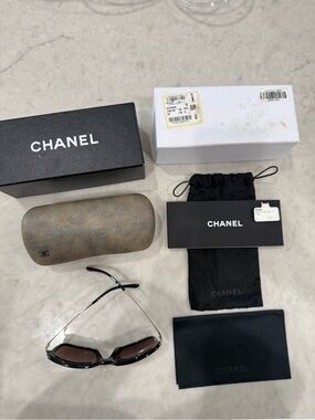 CHANEL Black Frame Sunglasses with Brown Gradient Lenses